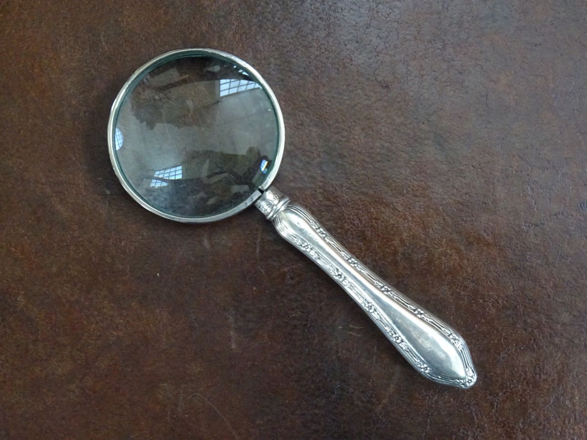 Silver handle magnifying glass